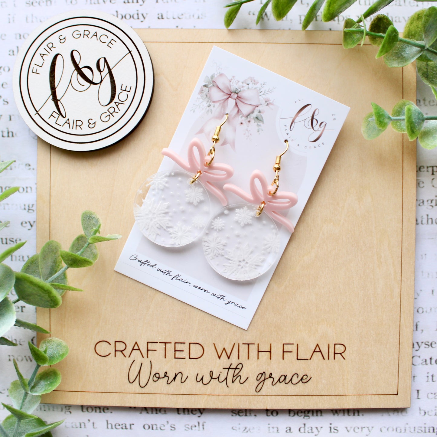IN STOCK Christmas Earrings: Snowflake engraved acrylic circle with pink bow