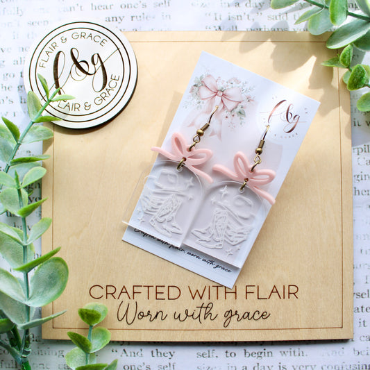 Bookish Earrings: Book stack with boots and hat engraved on clear acrylic